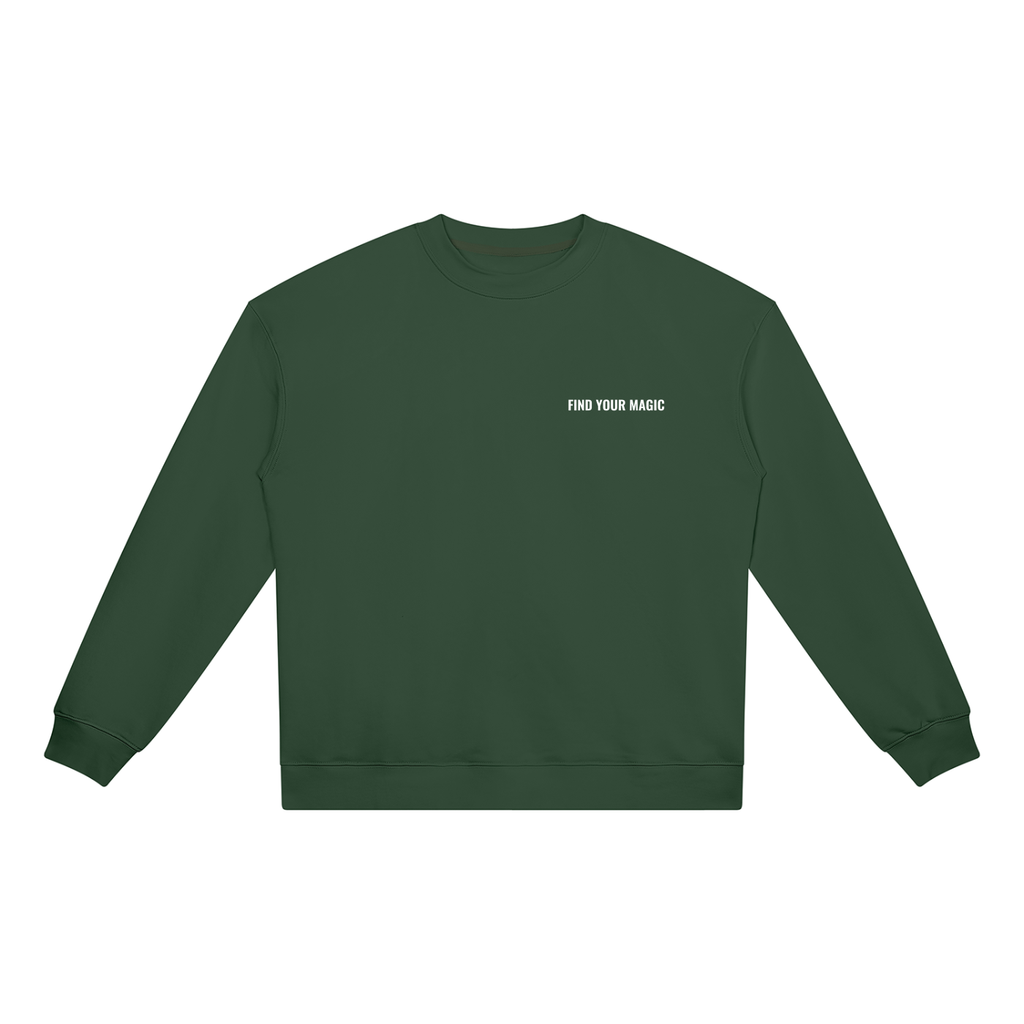 Compass Crewneck Sweatshirt. A green crewneck sweatshirt with a The infinity style Studio compass logo.  Keep you looking stylish, warm and comfy on your confidence recovery journey. green crewneck front view