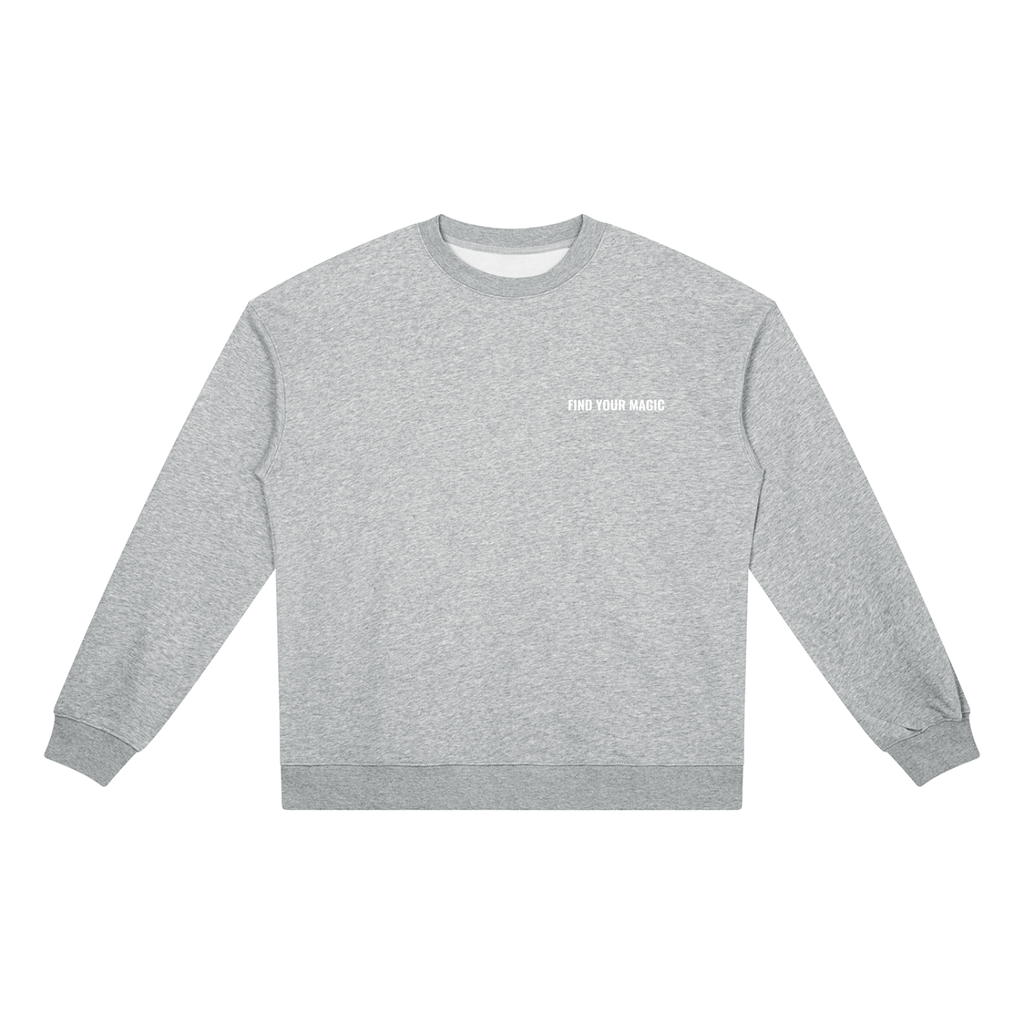 Find your magic A grey crewneck sweatshirt with a The infinity style Studio compass logo.  Keep you looking stylish, warm and comfy on your confidence recovery journey. grey crewneck front view
