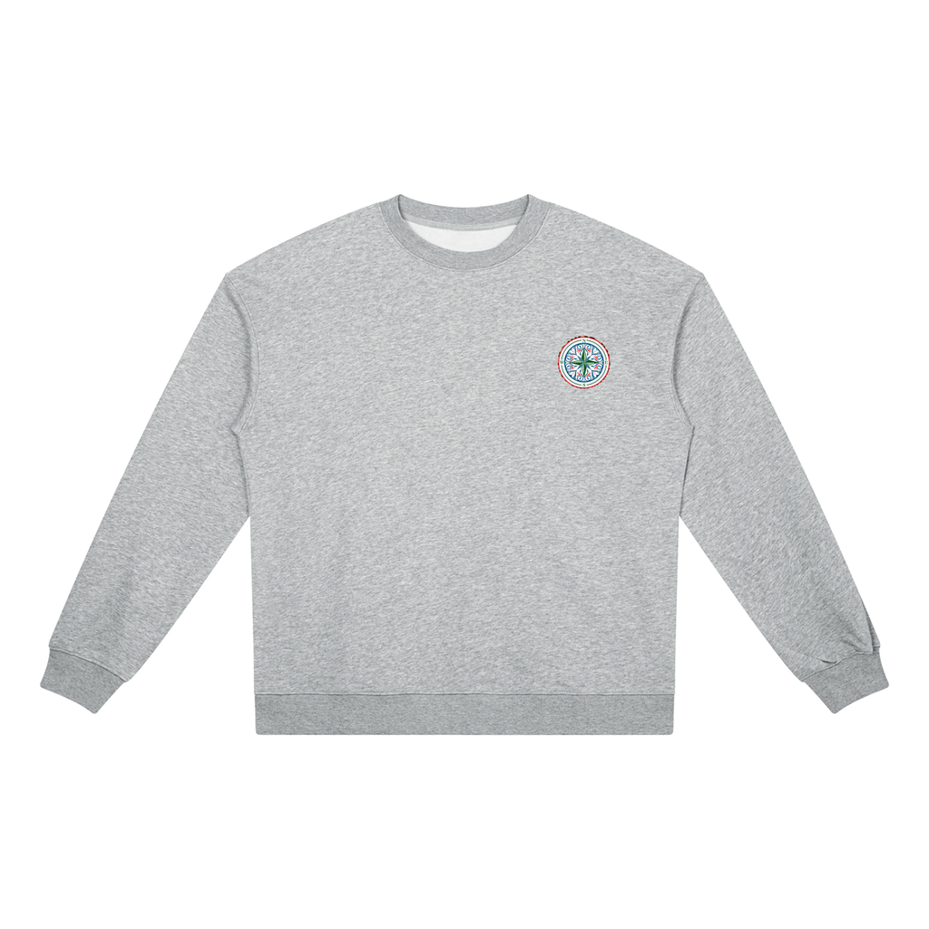Find your magic A grey crewneck sweatshirt with a The infinity style Studio compass logo.  Keep you looking stylish, warm and comfy on your confidence recovery journey. grey crewneck front view
